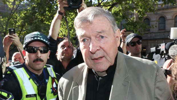 Cardinal George Pell arrives at County Court in Melbourne. 