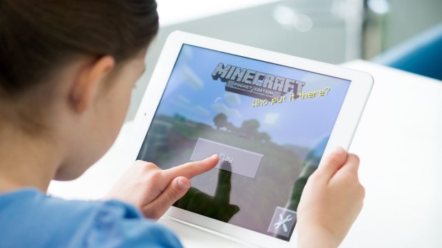 A child entering the virtual world of Minecraft.