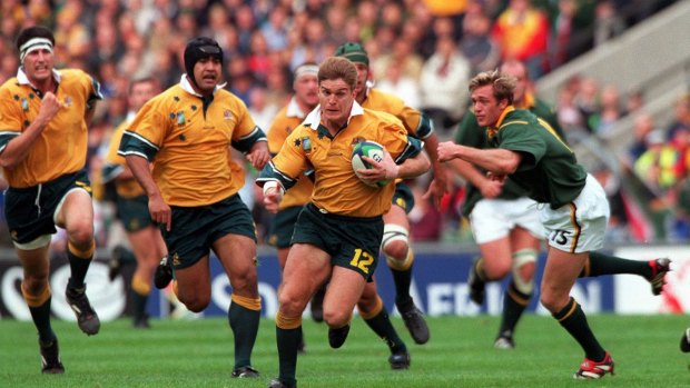 Big step: two-time World Cup winner Tim Horan has praised Rugby Australia's decision to instil closer links with the country's Super Rugby sides.