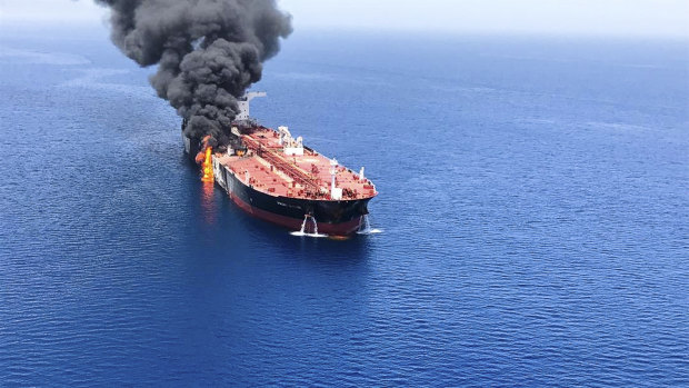 An oil tanker is on fire in the sea of Oman.