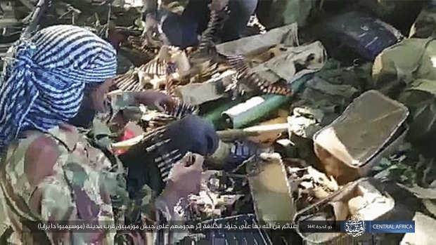 Rebel fighters and weapons after clashes with Mozambique forces last year.