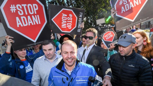 Anti-Adani campaigners surround Federal Treasurer Josh Frydenberg’s Kooyong in Kooyong electorate in Melbourne, protesting the Carmichael coal mine.