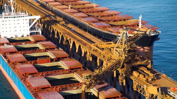 A ship being loaded with iron ore from a Rio Tinto mine in the Pilbara.
