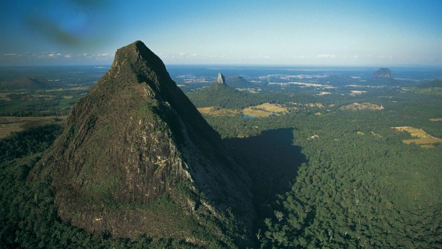 The man was climbing the highest of the Glasshouse Mountains, the Mount Beerwah,