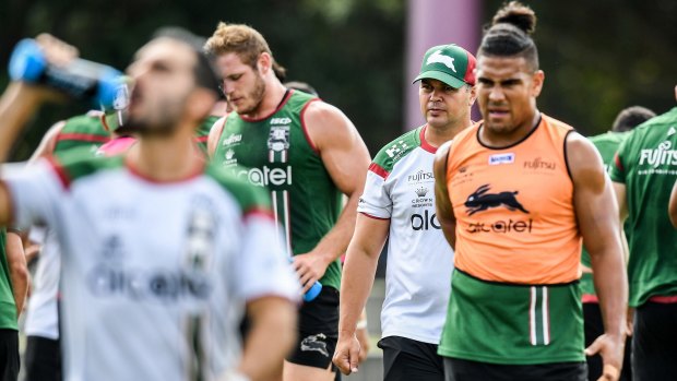 Biding his time: Souths coach Anthony Seibold (second from right).