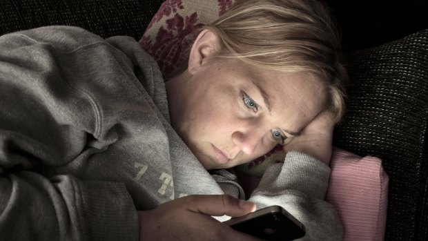 More than a quarter of parents say they use their mobile devices as they go to bed.