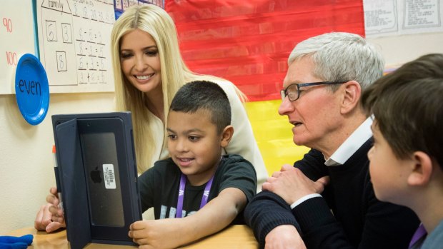 Apple CEO Tim Cook, right, and Ivanka Trump on their schools tour.