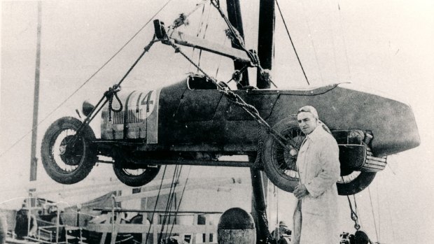 Arthur Terdich supervises the unloading of his Bugatti car at Phillip Island.