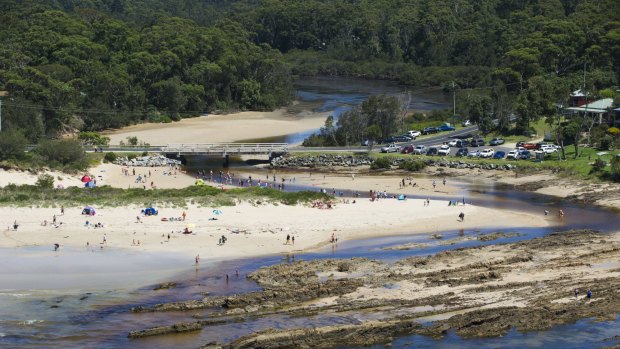 Emergency services were called to the beachside town of Broulee on the NSW South Coast, where a crime scene was established.