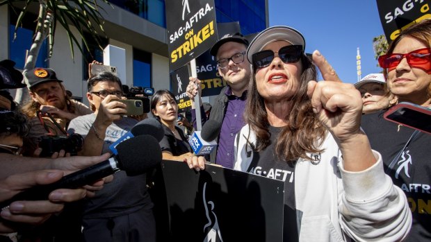 SAG-AFTRA president and actor Fran Drescher speaks at a strike rally in Los Angeles in July.