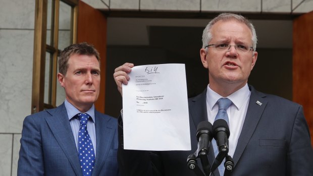 Attorney-General Christian Porter and Prime Minister Scott Morrison with the proposed bill. 