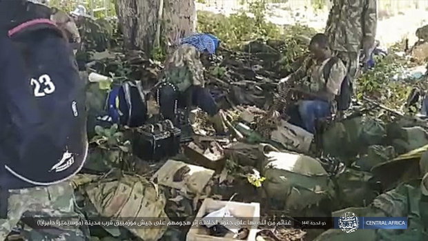 Islamic extremist rebels gather after clashes with Mozambican government troops near Mocimboa da Praia, in the country's north in August.