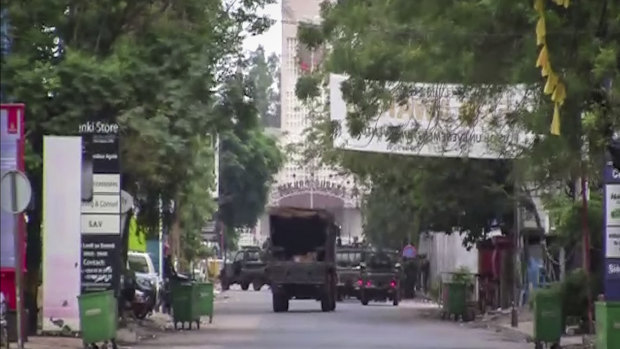 A military truck is seen near the presidential palace in the capital Conakry, Guinea.