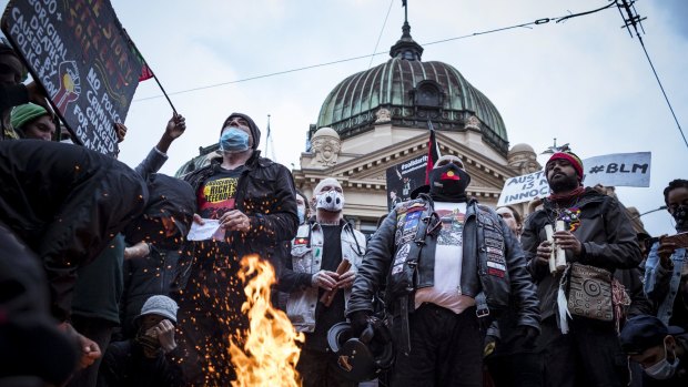 Protesters outside Flinders Street Station.