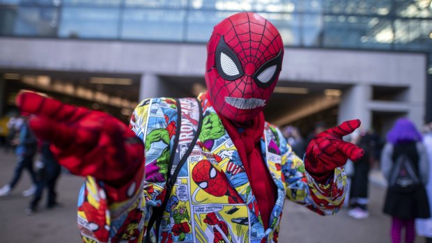 A fan dressed as Spider-Man poses during New York Comic Con.