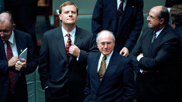 Treasurer Peter Costello and Prime Minister John Howard in Parliament. Howard famously ruled out introducing the GST, declaring "never ever".