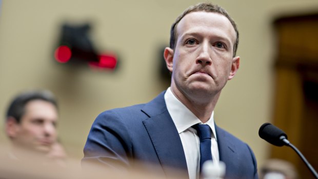 Under pressure: Mark Zuckerberg fronts a congressional hearing in April.
