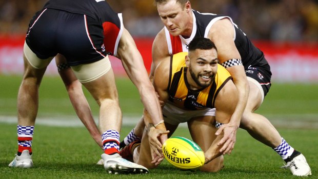 Hawthorn's Jarman Impey gets his hands dirty.