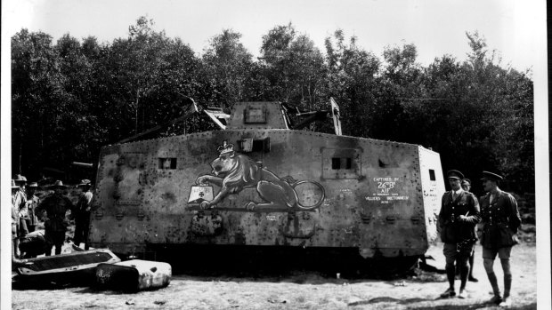 A German tank captured near Villers-Bretonneux,. The Germans had painted a German tank crushing a British lion. A British artist reversed the scene.
