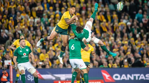 Offence? Israel Folau contests a kickoff, apparently illegally, against Ireland. 