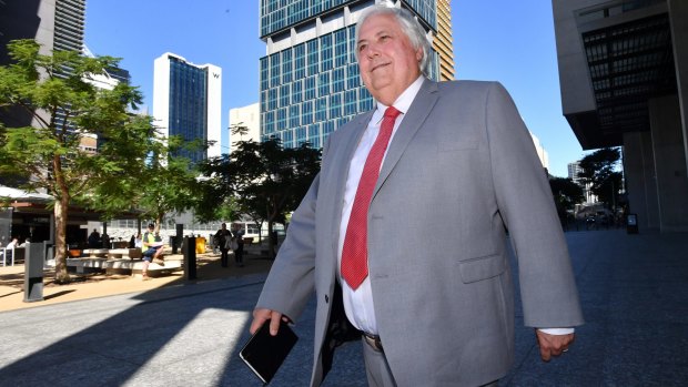 Clive Palmer leaves the Supreme Court, facing a deadline to disclose his assets.