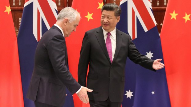 Chinese president Xi Jiping welcomes former Australian prime minister Malcolm Turnbull in 2016. 