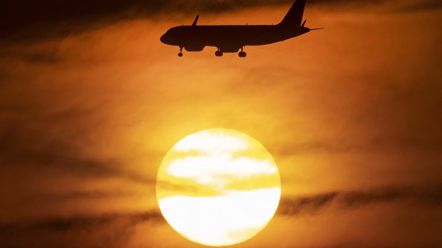 The sun sets in Frankfurt, Germany, as extreme heat spreads across Europe. 