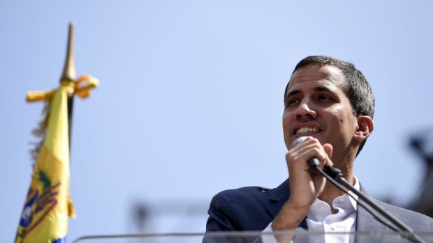 Juan Guaido, president of the National Assembly who swore himself in as the leader of Venezuela, speaks during a pro-opposition protest in Caracas.