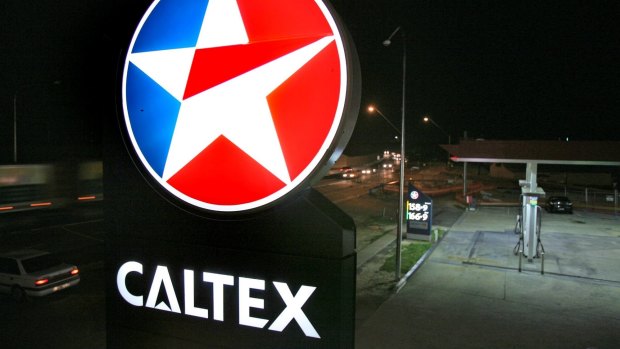 Caltex has had a bad six months due to sluggish consumer spending and falling refinery margins.