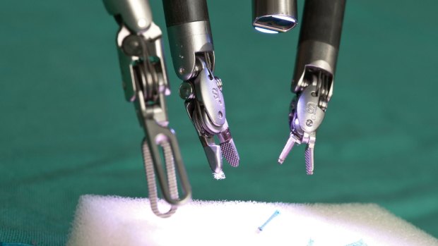 The AMA says public money shouldn't yet be poured into robotic surgery.