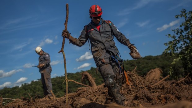 Rescue workers survey the damage in the first days after a Vale tailings dam failed in Brazil in January, killing hundreds of people.