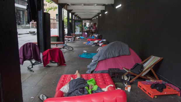 Homeless people sleeping in Martin Place in Sydney.

