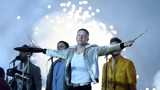 On song: Macklemore performs during the NRL grand final in 2017.
