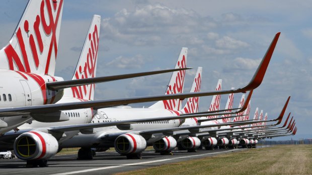 Virgin Australia planes sit idle at Brisbane Airport during the pandemic. 