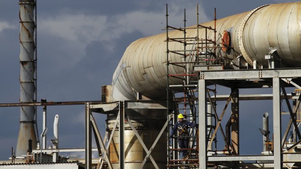 "Slop" diesel refined back into a fuel at the old Caltex oil refinery at Kurnell in Sydney has forced the government to overhaul pioneering environmental legislation put in place by the Howard government.