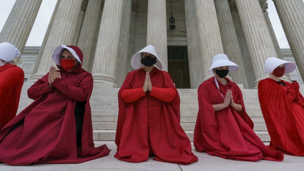 Activists opposed to Judge Barrett are dressed as characters from 'The Handmaid's Tale'.