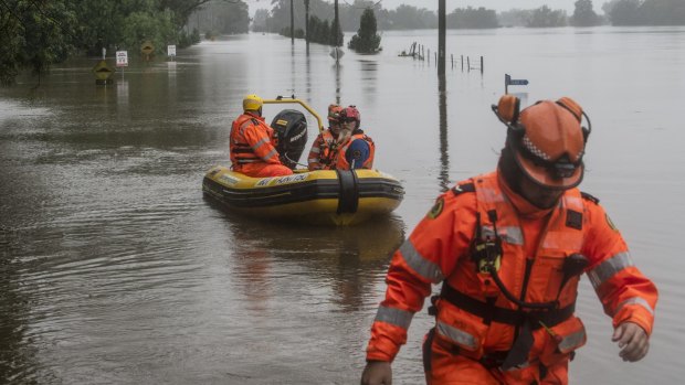 SES volunteers heading out to Ebenezer,   near Windsor, on a flooded Hawkesbury River.