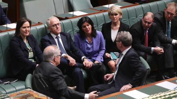Kelly O'Dwyer, Malcolm Turnbull, Julia Banks and Julie Bishop speak with Scott Morrison and Christopher Pyne on August 23, 2018.