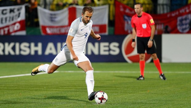 Hungry lion: England's Harry Kane scoring a goal from the penalty spot.