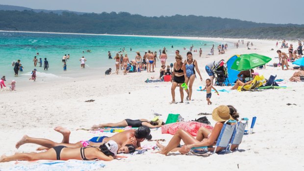 Hyams Beach has been promoted as having some of the world's whitest sand, but has become a victim of its own success. 