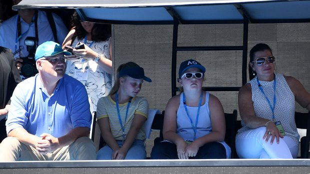 Prime Minister Scott Morrison, daughters Lily and Abbey and wife Jenny watch the match between Maria Sharapova and Ashleigh Barty.