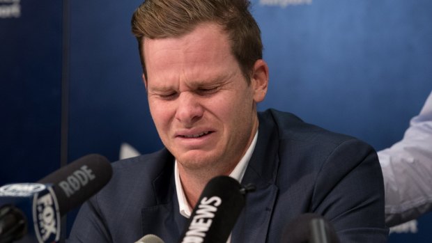 Former Australian cricket captain Steve Smith addresses the media at Sydney Airport after arriving back from the cheating scandal in South Africa.