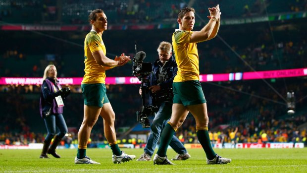 Incumbent: Bernard Foley, right,  and Matt Toomua celebrate after the 2015 Rugby World Cup Pool A match between Australia and Wales at Twickenham Stadium.