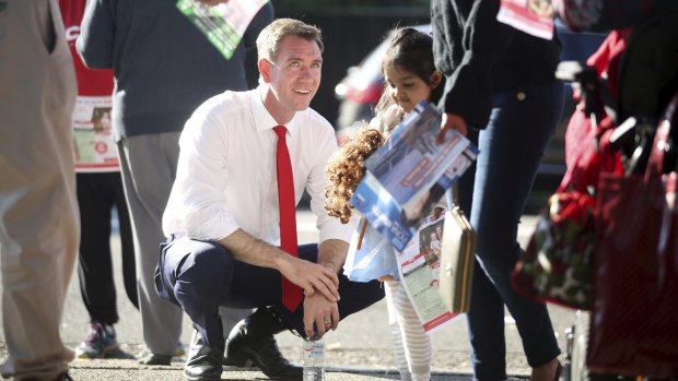 Labor Candidate for the seat of Reid Sam Crosby, campaigning at Concord Public School on election morning, was beaten by Fiona Martin.