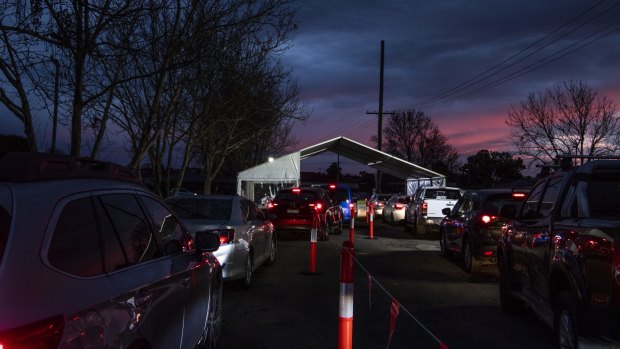 Long queues form at a COVID-19 testing drive-through clinic in Fairfield West on July 14.
