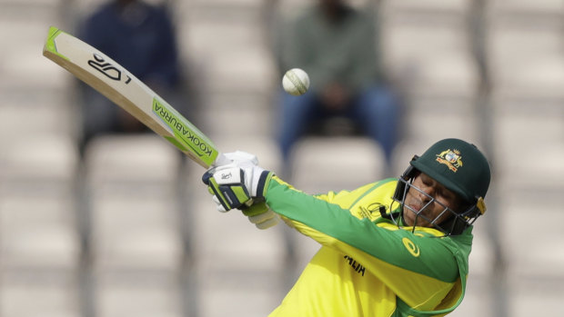 Khawaja hits a boundary during the World Cup warm-up match against Sri Lanka.