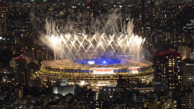 Fireworks are let off over the Olympic Stadium during the closing ceremony of the Tokyo Olympics.