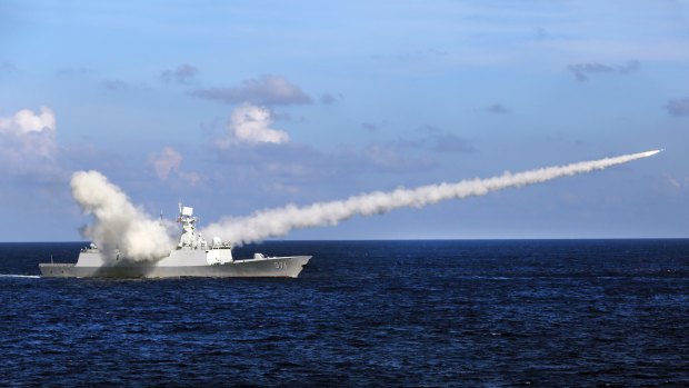 The Chinese missile frigate Yuncheng launches an anti-ship missile during a military exercise in the waters near south China's Paracel Islands last year.