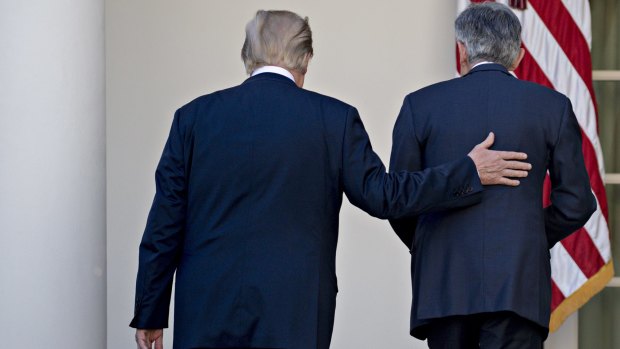 US President Donald Trump, left, and Jerome Powell, US Federal Reserve governor. Trump seems to have turned on his own pick for US Fed chair.