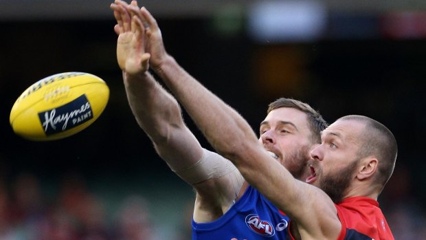 Jordan Roughead of the Bulldogs competes in the ruck with Demons big man Max Gawn.